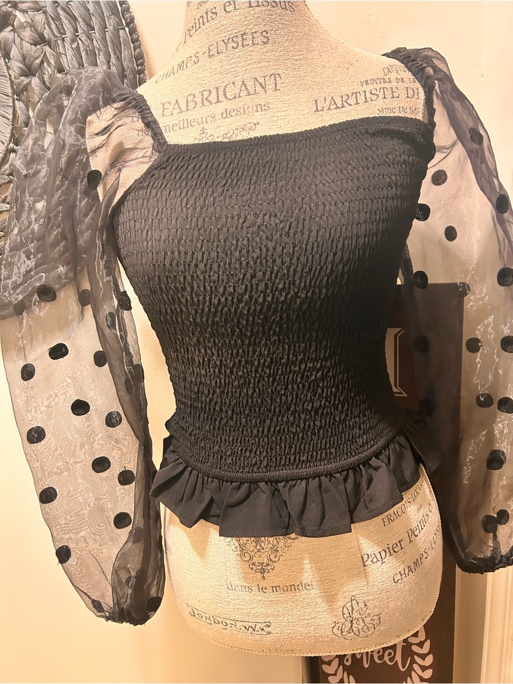 Black Smocked Peplum Blouse with Sheer Polka-Dot Puff Sleeves